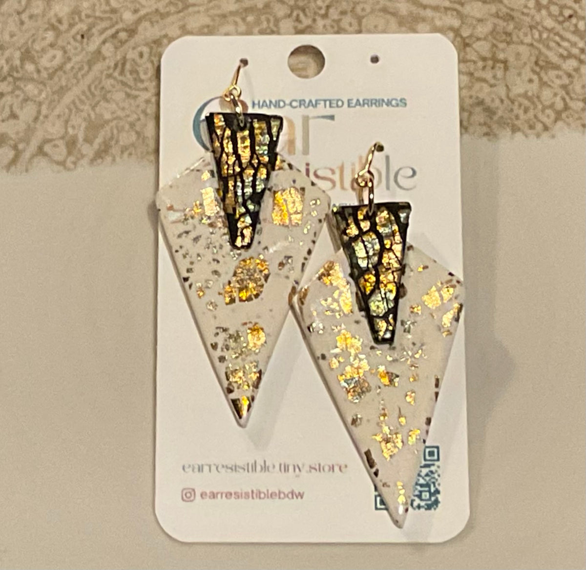 Dangle earrings: cream, black variegated metallic arrow