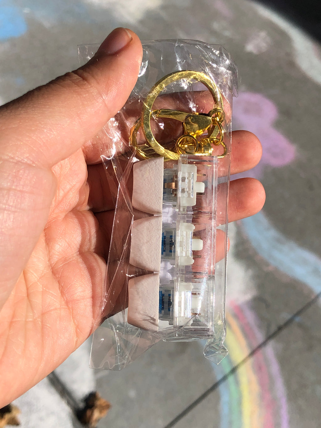 Sakura Tin Tin Clicker Keychain