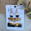 Dangle earrings: navy and cream with gold charm