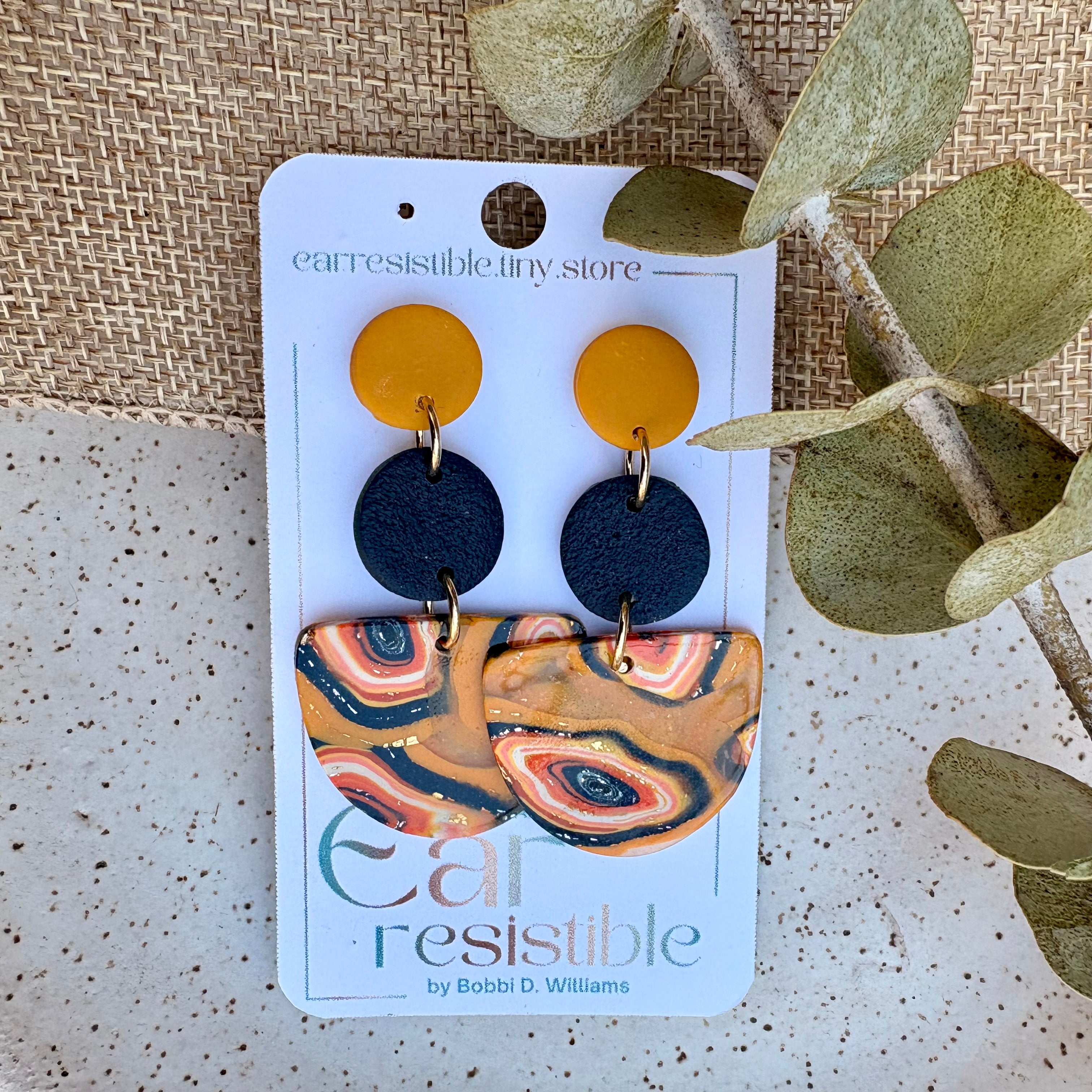Dangle earrings: navy, yellow, and orange