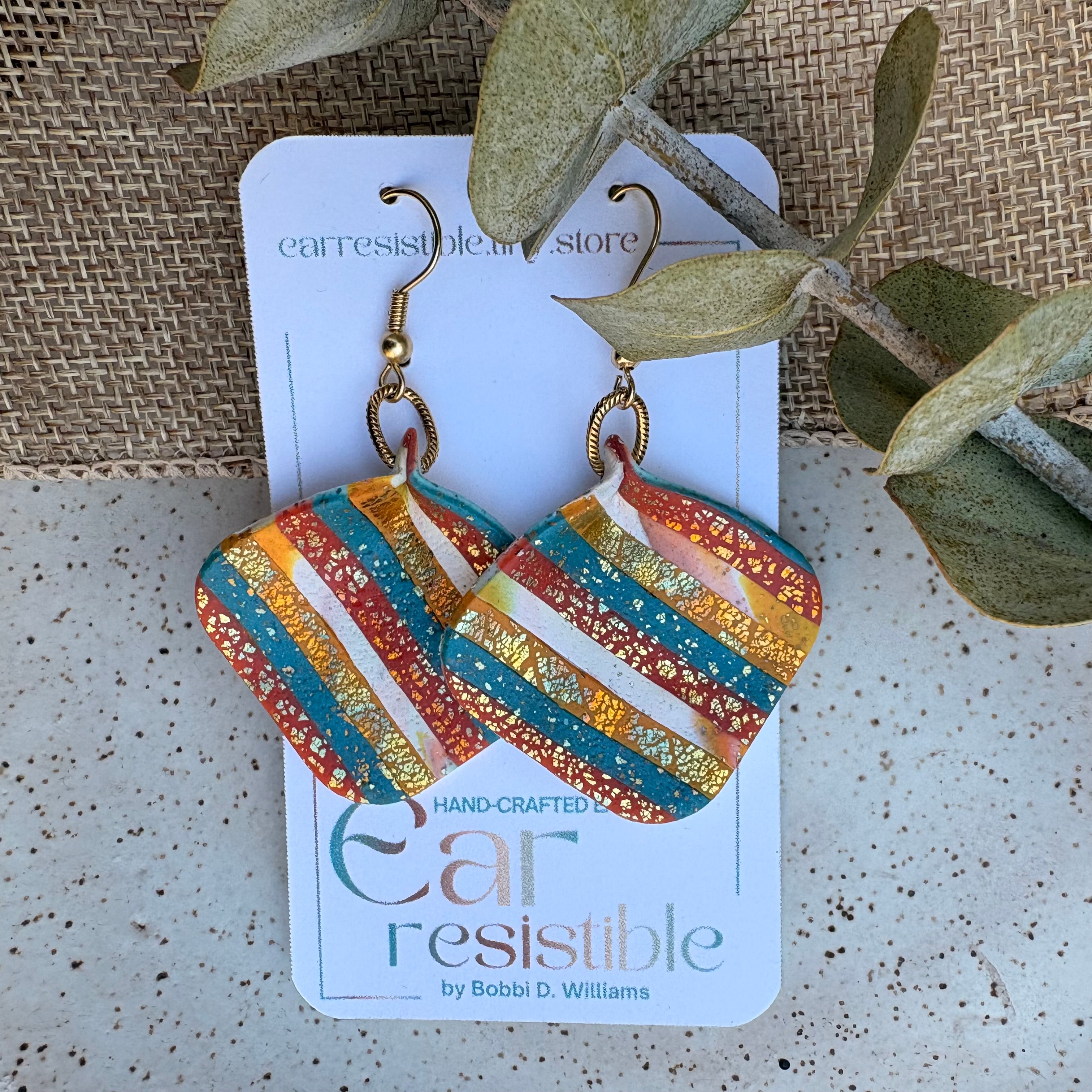 Dangle earrings: stripped pinched square with gold