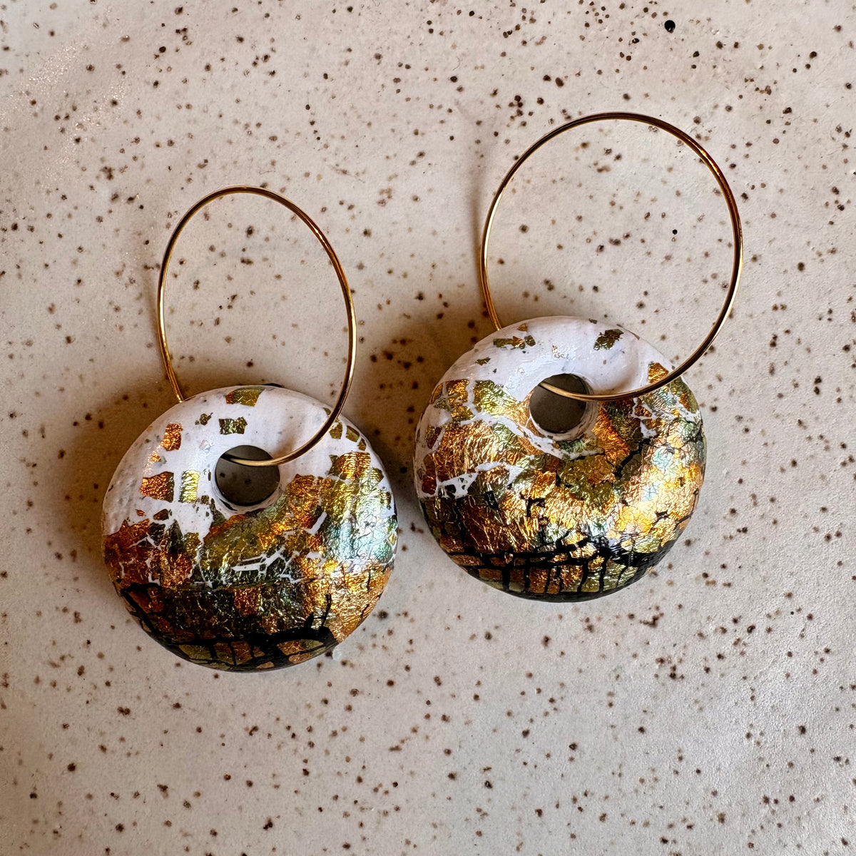 Hoop dangle bubble earrings: cream, black, and variegated metal